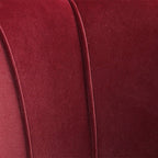 Fauteuil en velours, forme coquillage avec pieds en métal doré, rouge